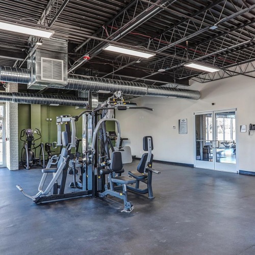 Get your workout on a room with exercise equipment